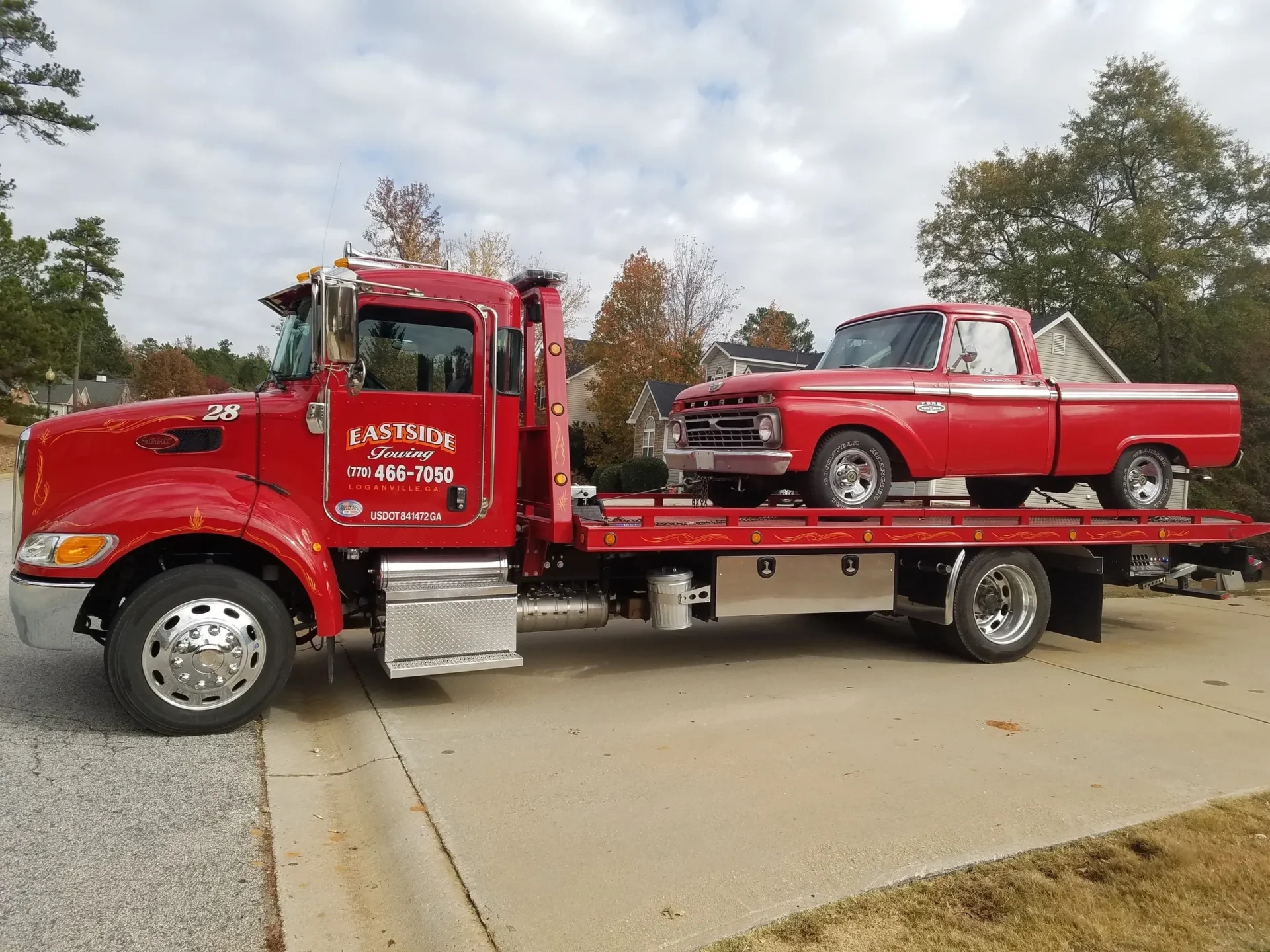 red car towing